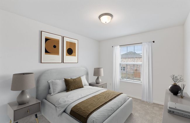 Spacious secondary bedroom with large windows *Photos of furnished model. Not actual home. Representative of floor plan. Some options and features may vary | Image 4