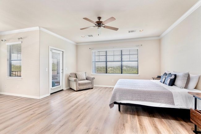 Primary bedroom (second level) featuring large sitting area and waking up to amazing views! | Image 12