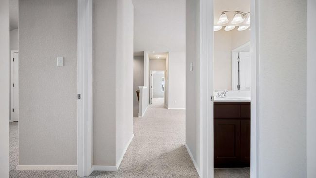 Corridor with a sink and light carpet | Image 20