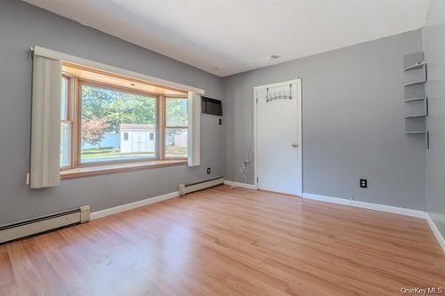 21 Mount Snow Ln, Coram, NY, 11727-2027 | Card Image