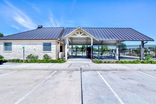 The community pool area features a pavilion for family gatherings. | Image 34