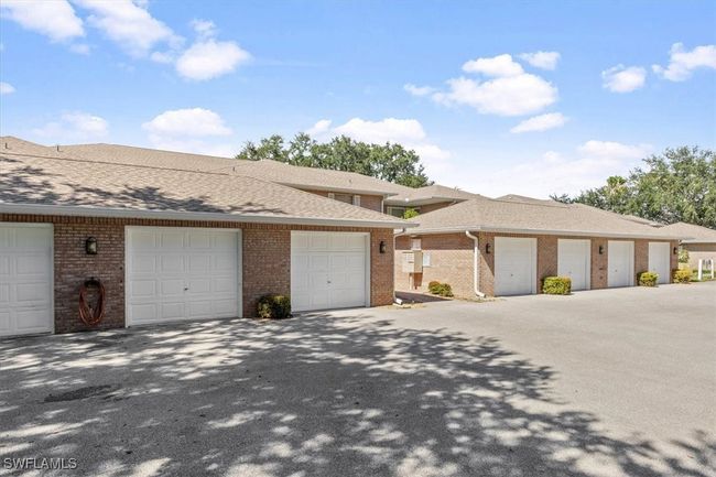 View of front facade featuring a garage | Image 21