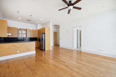 Kitchen Breakfast Bar opening to Living Area | Image 3