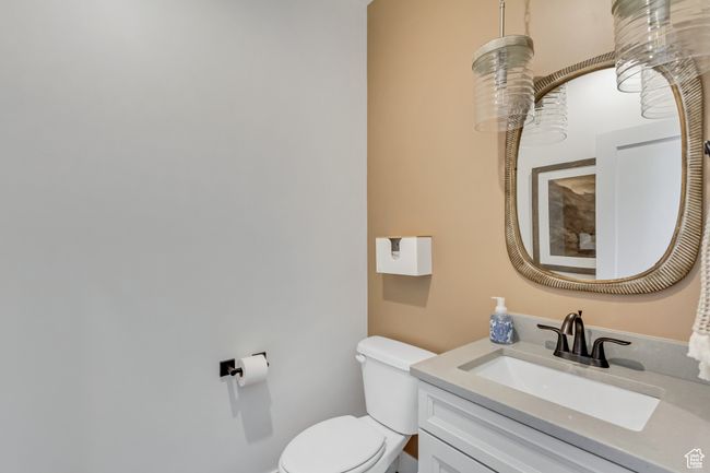 Bathroom featuring toilet and vanity | Image 22