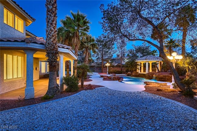 View of yard with an outdoor pool and a patio | Image 5