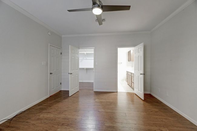 Primary bedroom has attached full bath& walk-in closet. | Image 13