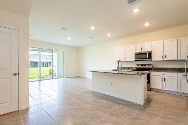 33063 Tulip Petal Ln, Townhouse with 3 bedrooms, 3 bathrooms and null parking in WESLEY CHAPEL FL | Image 11