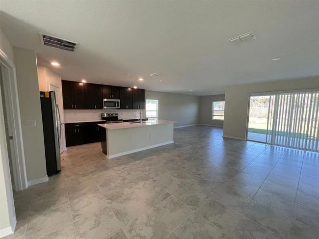 1832 Ancestry Trl, House other with 5 bedrooms, 3 bathrooms and null parking in KISSIMMEE FL | Image 6