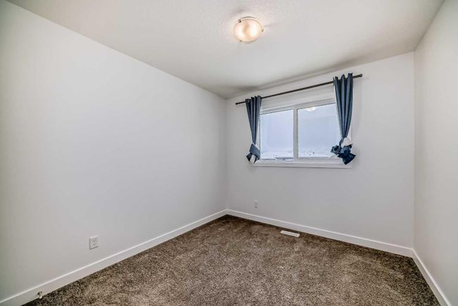 64 Evanscrest Place Nw, Home with 3 bedrooms, 2 bathrooms and 2 parking in Calgary AB | Image 29