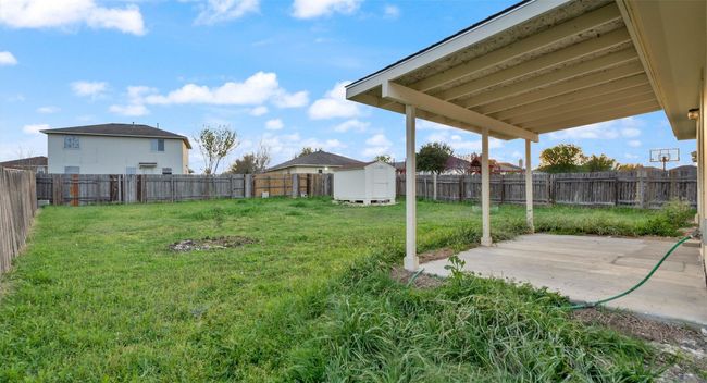 Large backyard with covered patio | Image 22