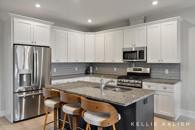 Kitchen with soft-close cabinets and stainless steel appliances | Image 12