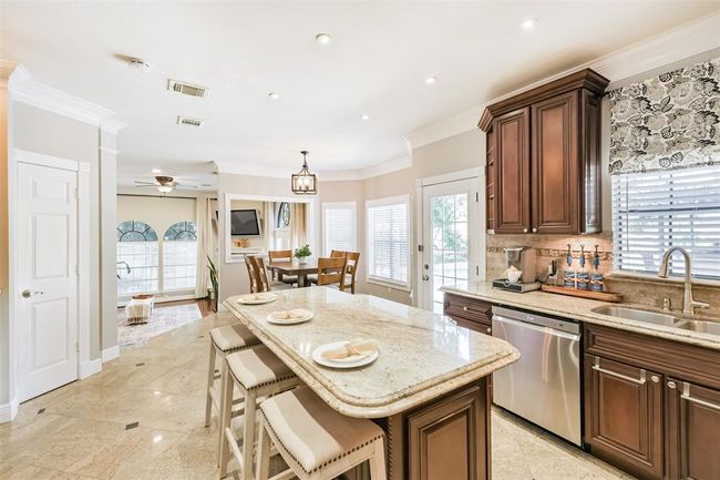 Direct kitchen access to the outdoors enhances your entertaining experience. | Image 13