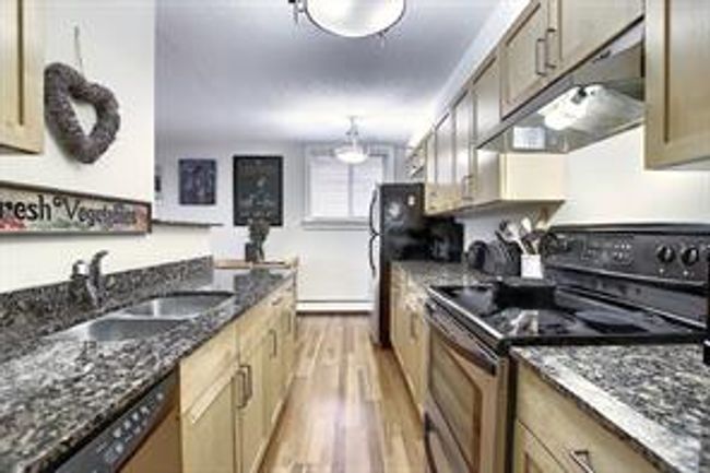 105 - 315 9a St Nw, Condo with 2 bedrooms, 1 bathrooms and 1 parking in Calgary AB | Image 6