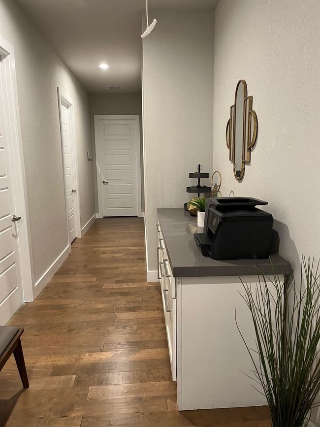 Hallway featuring dark wood-style flooring and recessed lighting | Image 20