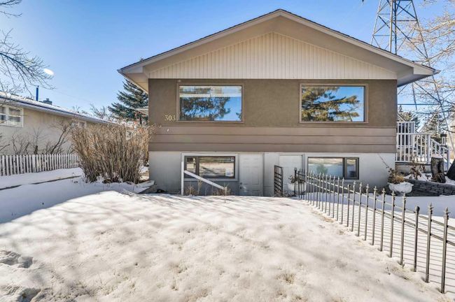 303 38 Street Sw, Home with 3 bedrooms, 2 bathrooms and 3 parking in Calgary AB | Image 2