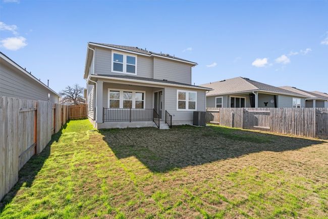 Back of house featuring a fenced backyard | Image 35