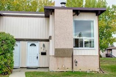 110 Oaktree Close Sw, Home with 2 bedrooms, 1 bathrooms and 1 parking in Calgary AB | Image 1