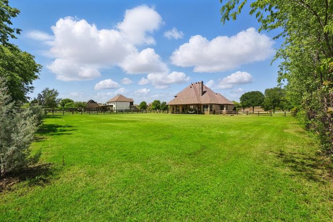 View of yard featuring a view of rural / pastoral area | Image 32