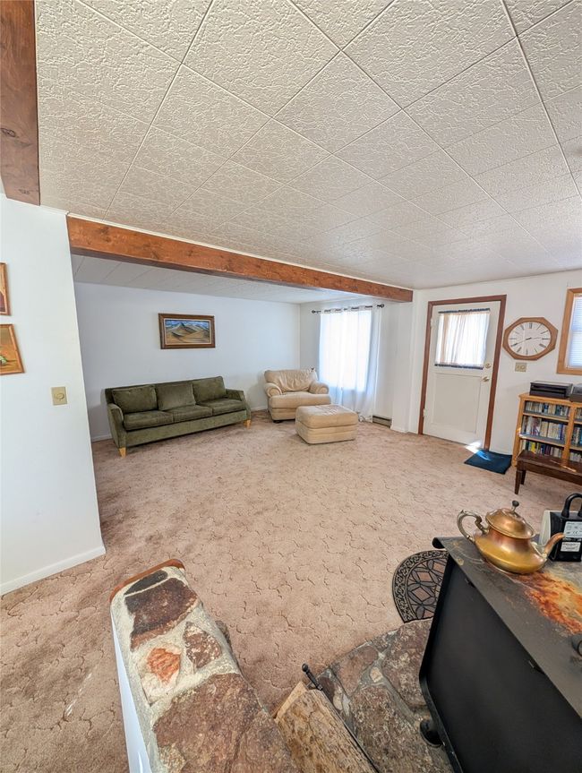 View of carpeted living room | Image 8