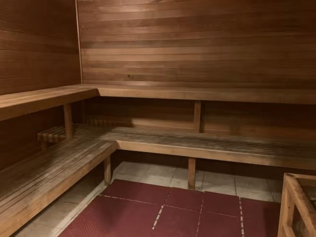 Sauna / steam room featuring wood walls and tile patterned flooring | Image 28