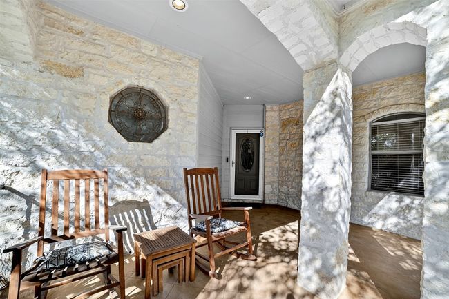 Cozy front porch looking out to the courtyard | Image 5