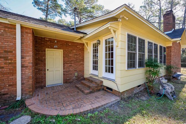View of exterior entry featuring a patio area | Image 28