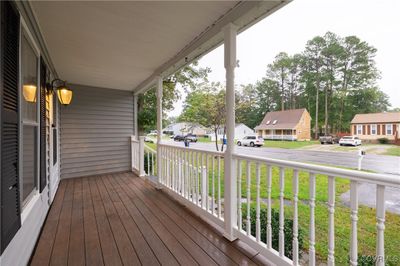 Deck with a lawn and a porch | Image 1