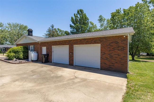 Garage featuring driveway | Image 5