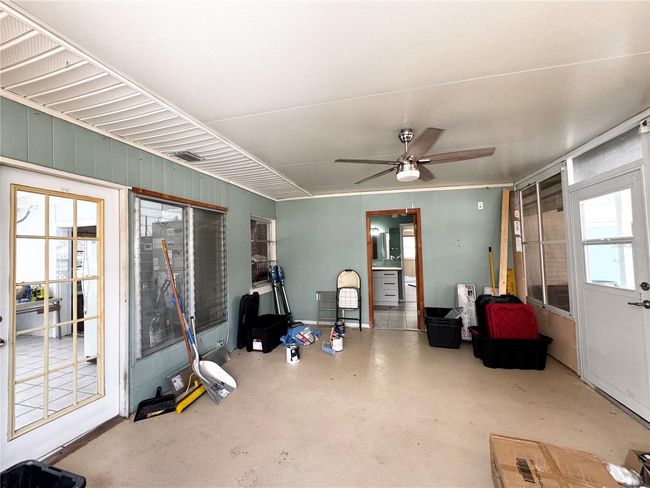 Florida room off the other side of the kitchen at the back of the house | Image 37