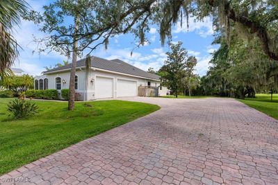 12800 Treeline Court, House other with 4 bedrooms, 3 bathrooms and null parking in North Fort Myers FL | Image 2