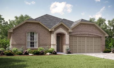 View of front facade with a front yard and a garage | Image 1