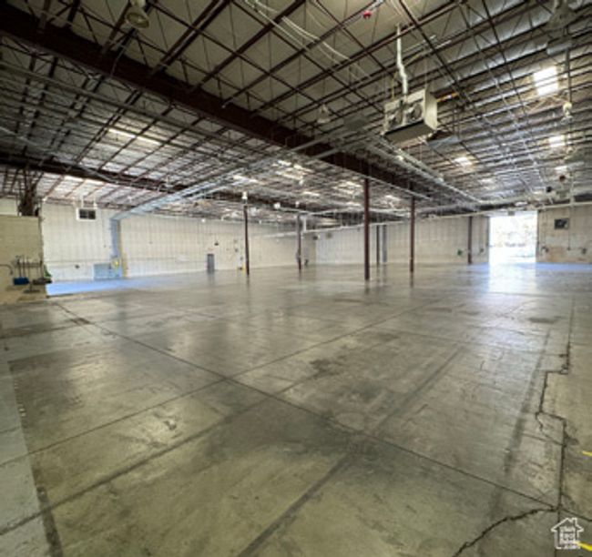 Garage featuring a garage door opener | Image 12