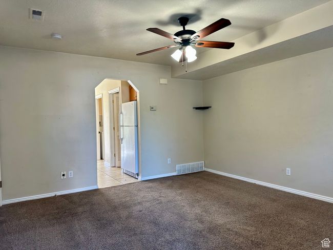 Spacious living room adjacent to the kitchen and dining which make the room feel open and airy | Image 4