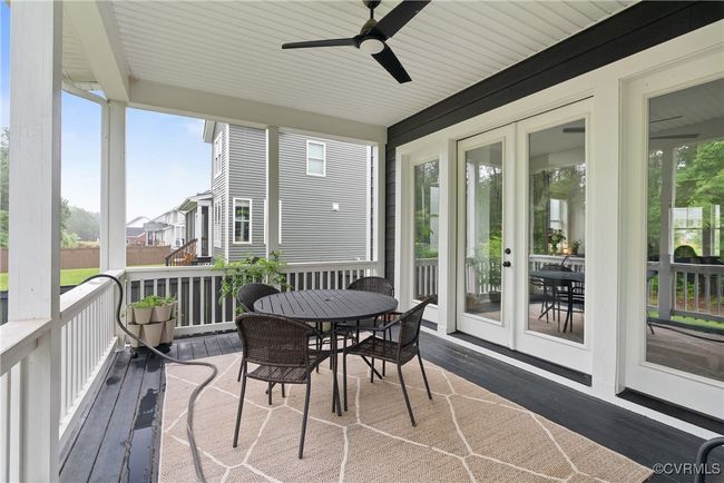 Sunroom / solarium with ceiling fan and outdoor dining​​‌​​​​‌​​‌‌​‌‌​​​‌‌​​‌‌​‌​​​​​‌ area | Image 47