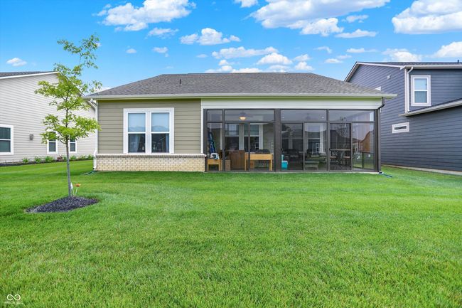 Rear view of property with a sunroom | Image 24