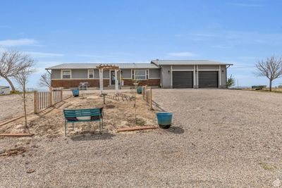 View of front of house featuring a garage | Image 2