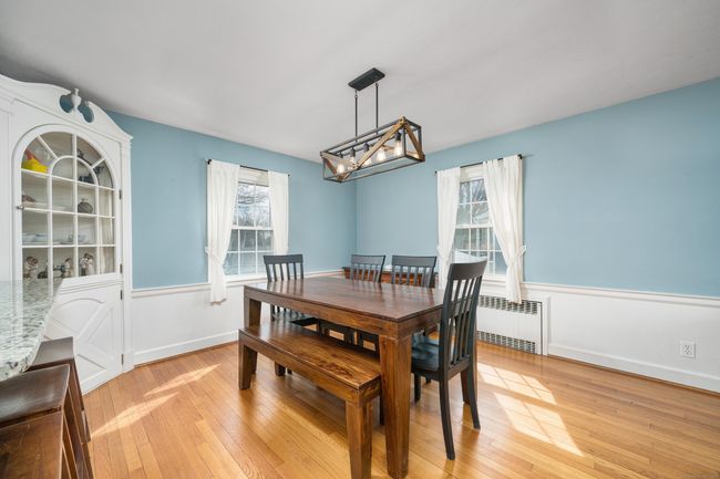Gorgeous dining room hardwood flooring and built-in hutch | Image 16