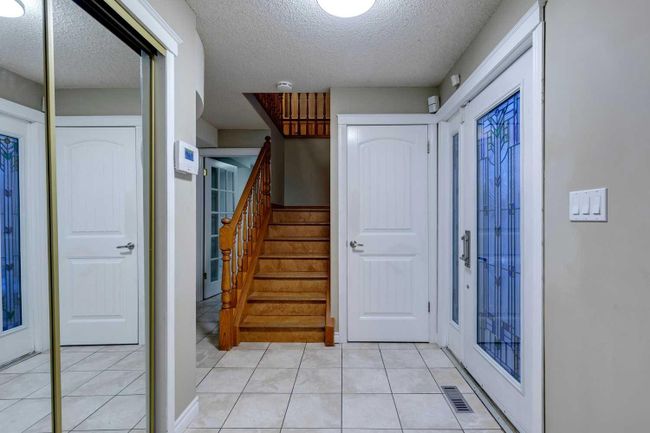 305 East Chestermere Drive, Home with 4 bedrooms, 2 bathrooms and 6 parking in Chestermere AB | Image 3