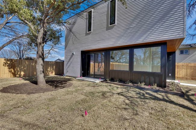 Rear view of property featuring fence and a yard | Image 19