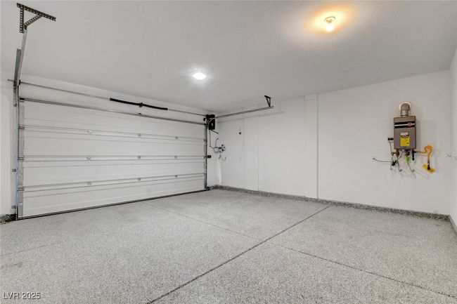 Garage featuring water heater | Image 48