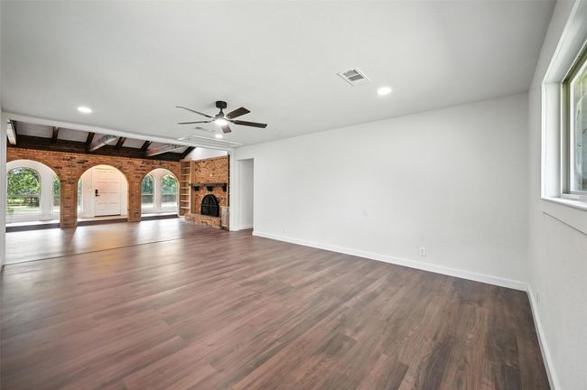 This space would make a great family room or it could be divided into a second living space and a dining area. Or just a huge informal living room! | Image 14