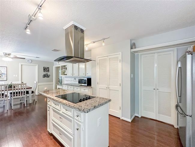 Cooking or meal prep is made simple in this modern kitchen! | Image 4