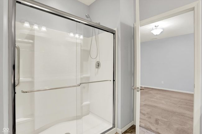 full bathroom featuring a shower stall | Image 13