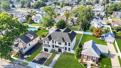 8 Schoolhouse Rd, Levittown, NY, 11756-2202 | Card Image