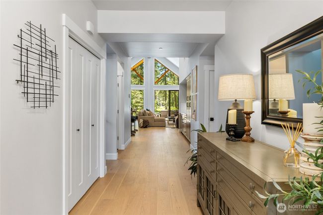 Wide hallway welcomes you as you enter this home. | Image 4