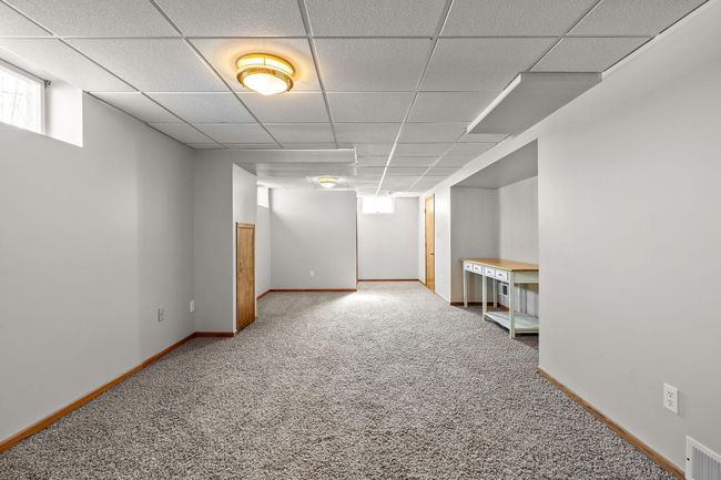 The finished full basement is ready to be made into a family room or exercise room. | Image 15