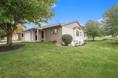 6527 Wood Dora Drive, Condo with 3 bedrooms, 2 bathrooms and null parking in Caledonia MI | Image 2