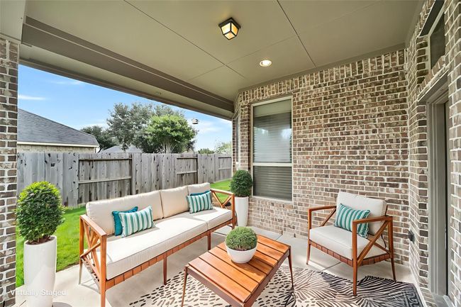 This yard is meant for those who want an easy to maintain entertaining area. The irrigation system allows the yard to stay lush and green all year long! | Image 28