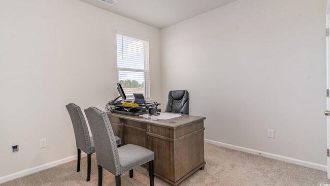 Home office featuring baseboards and light carpet | Image 20