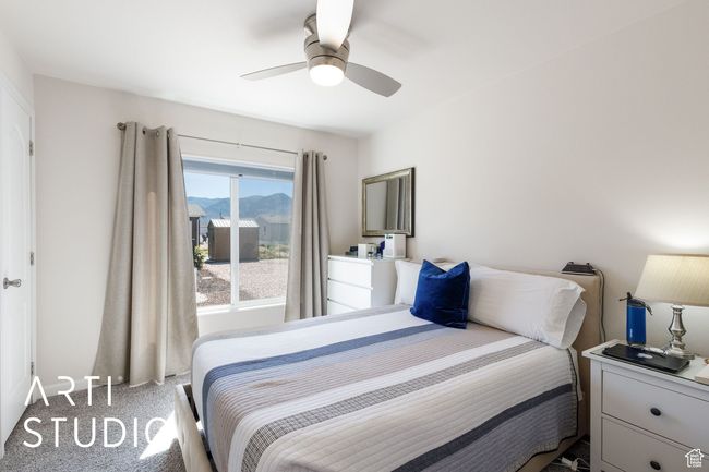 Carpeted bedroom featuring a mountain view and a ceiling fan | Image 17